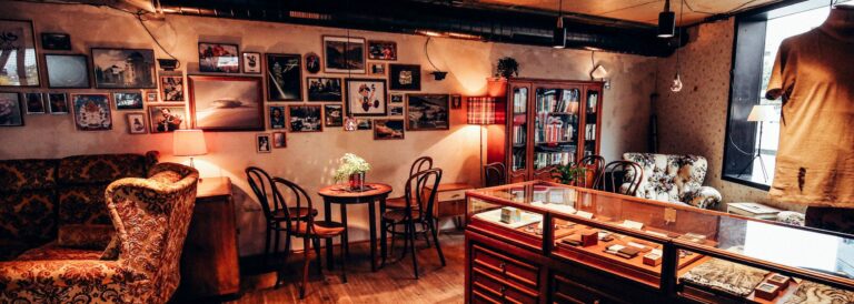 Cozy interior of Wohnzimmer Bar in Innsbruck, Austria, featuring warm lighting, plush seating, and a relaxed atmosphere, offering a comfortable setting for enjoying cocktails and socializing with friends Cozy interior of Wohnzimmer Bar in Innsbruck, Austria, featuring warm lighting, plush seating, and a relaxed atmosphere, offering a comfortable setting for enjoying cocktails and socializing with friends